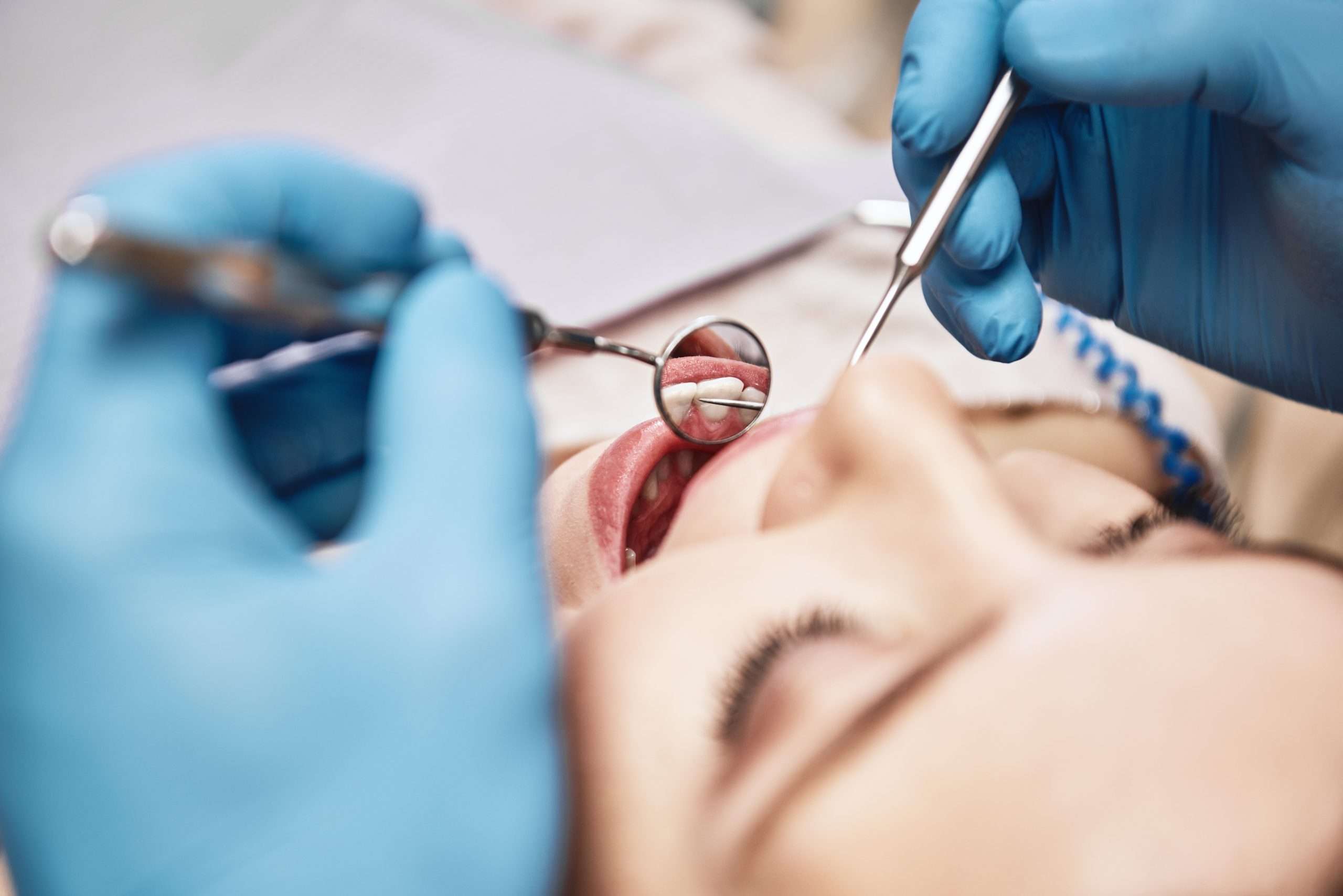 woman getting a dental cleaning and preventative care at abington center in clarks summit, pa
